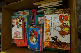 A quantity of Rupert books and jigsaws.