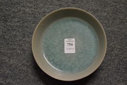 A Chinese celadon circular dish.