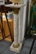 A marble and ormolu column.