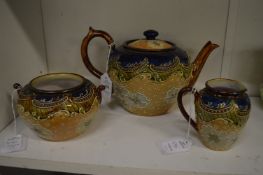 A Royal Doulton Slaters patent three piece tea service comprising teapot, sugar bowl and cream jug.