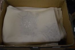 Various decorative tablecloths.