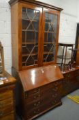 A Georgian mahogany bureau bookcase of typical form.