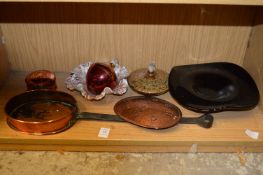 Copper chestnut roaster and decorative items.