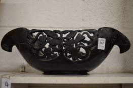 Chinese carved wood vessel.