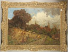 KARL HEFFNER (1849 - 1925) GERMAN. Landscape with a town, two church towers, buildings and trees,