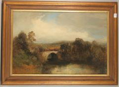 19TH CENTURY ENGLISH SCHOOL. Yorkshire river landscape with arched stone bridge, a church amidst the