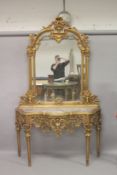 A GOOD LOUIS XVITH STYLE GILTWOOD CONSOLE AND MIRROR with marble top with urns, flowers and column