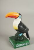 A CAST IRON GUINNESS TOUCAN. 6ins high.