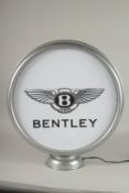 A BENTLEY GLOBE LAMP. 16ins diameter.