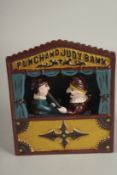 A CAST IRON PUNCH AND JUDY.