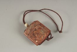 A SMALL CARVED HARDWOOD INRO.