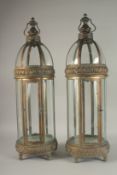 A LARGE PAIR OF COPPER CIRCULAR LANTERNS. 31cms high.