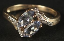 A 9CT YELLOW GOLD DOUBLE MARQUISE-CUT LILAC TOURMALINE AND DIAMOND RING, boxed.