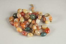 A SCOTTISH AGATE BEAD NECKLACE. 72cms long.