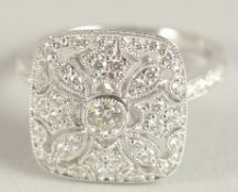 AM 18CT WHITE GOLD AND DIAMOND ART DECO DESIGN RING, with diamond set bezels and shoulders.