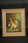 J. WATSON. Dutch still life, flowers in a bowl on a ledge. Signed. Oil on board. 10