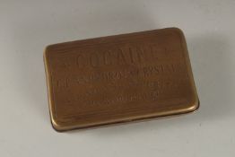 A REPLICA BRASS COCAINE BOX.