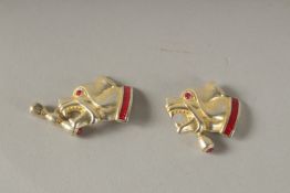 A GOOD PAIR OF RUSSIAN SILVER DOG'S HEAD CUFFLINKS.