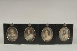 A SET OF FOUR LATE VICTORIAN PORTRAIT MINIATURES OF LADIES. Each: 15cms x 12.5cms.