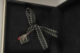 A LINKS OF LONDON SILVER CHARM, boxed.