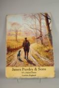 A TIN SIGN, JAMES PURDEY & SONS. 28ins x 20ins.