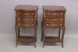 A PAIR OF LOUIS XVITH STYLE INLAID SERPENTINE BEDSIDE CUPBOARDS with three drawers and under-tier.