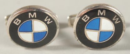 A PAIR OF STERLING SILVER AND ENAMEL BMW EMBLEM CUFFLINKS.