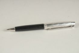 A CARAN D'ACHE PEN.
