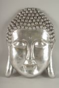 A SILVERED WALL BUDDHA.