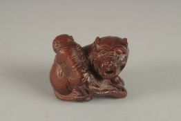 A CARVED JADE DOG OF FO. Signed. 1.5ins.