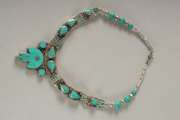 A TIBETAN TURQUOISE NECKLACE.