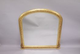 A GILTWOOD OVERMANTLE MIRROR. 48ins high x 46ins wide.