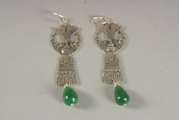 A PAIR OF SILVER AND JADE EARRINGS.