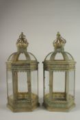 A PAIR OF COPPER CIRCULAR LANTERNS with crown tops. 25cms high.