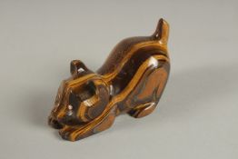 A RUSSIAN CARVED COLOURED TIGER'S EYE CAT. 2.5ins, in a fitted box.