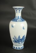 A CHINESE BLUE AND WHITE VASE decorated with figures. 30cms high.