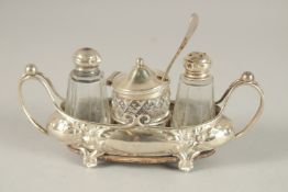 A THREE BOTTLE BOAT SHAPED CRUET. Birmingham 1905.