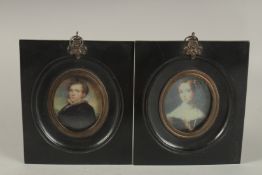 A PAIR OF VICTORIAN STYLE MINIATURES of a gentleman and lady.