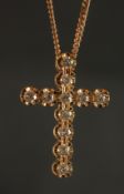 CERTIFICATED STYLISH 9CT YELLOW GOLD CROSS set with RBC diamonds on a 9ct yellow gold chain,