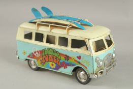 A TIN PLATE SURFING CAMPER VAN.