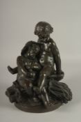 A GOOD 19TH CENTURY FRENCH BRONZE GROUP OF TWO CUPIDS depicting Harvest, on a circular base.
