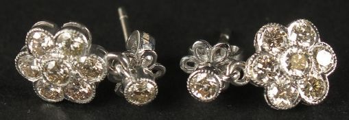 A PAIR OF 18CT WHITE GOLD DAISY-STYLE DIAMOND SET CLUSTER DROPLET EARRINGS, boxed. RBC diamonds 1.