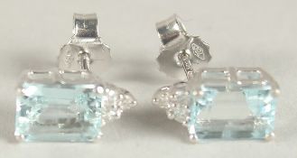 A PAIR OF 18CT WHITE GOLD, DIAMOND AND AQUAMARINE EAR STUDS.