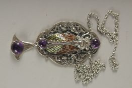 A SILVER AND LAPIS DRAGONFLY BROOCH.