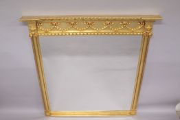 A GOOD LARGE REGENCY STYLE GILTWOOD OVERMANTLE MIRROR with garlands, urns and column sides. 60ins