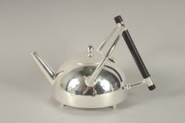 A CHRISTOPHER DRESSER DESIGN CIRCULAR SHAPED TEAPOT.