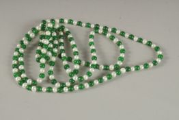A STRING OF JADE AND PEARLS. 50cms long.