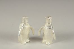 A PAIR OF PLATED PENGUIN SALT AND PEPPERS.