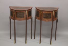 A PAIR OF LOUIS XVITH STYLE INLAID HALF-MOON BEDSIDE CUPBOARDS with three drawers. 27ins high x