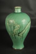 A CHINESE JIAN WARE DRAGON VASE. 32cms high.